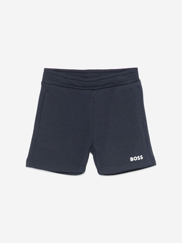 BOSS Baby Boys Logo Shorts in Navy Introduce the epitome of miniature chic with the BOSS Baby Boys Logo Shorts in Navy. Crafted with precision for SS2025, these shorts are the quintessence of style comfort for any young trendsetter. Here's why they're a must-have Elegant Navy Hue A classic, versatile colour that exudes sophistication. Iconic BOSS Branding Discreet yet distinctive logo detail for a touch of luxury. Premium Comfort Soft, breathable fabric ensures comfort all day long. Durable Design Made to withstand the adventures of playful toddlers.Refresh your little one's wardrobe with these stylish, high-quality shorts. Perfect for any occasion, they promise to keep him looking sharp feeling comfortable.