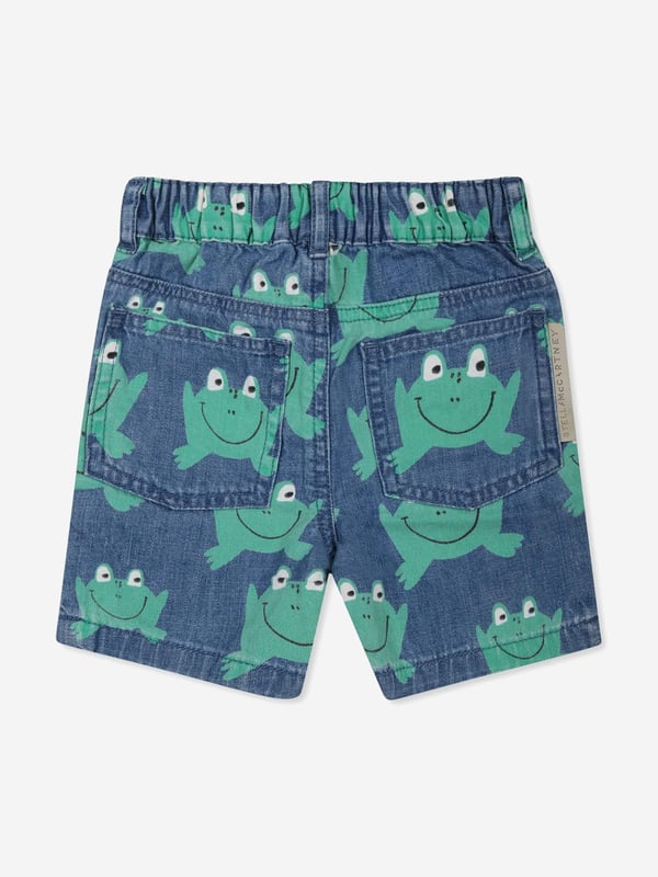 Stella McCartney portray a vibrant aesthetic via their cool and beautifully crafted designs. These baby boys indigo blue shorts are woven from beautiful eco-friendly cotton. Embellished with all over frog graphic print. They showcase an elasticated waistband with five classic pockets, belt loops, and a concealed fly and button fastening for easy dressing. Cotton 100