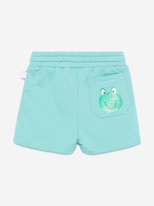 Introducing the Stella McCartney Baby Boys Jersey Shorts in Blue, an exquisite addition to any discerning little wardrobe for SS2025. Crafted with attention to detail, here are their standout features Luxurious Comfort Expertly made from soft, premium jersey, guaranteeing all-day ease. Classic Blue Hue A rich, vibrant blue that elevates everyday style. Versatile Appeal Perfect for playdates or park visits.Elevate your young one's collection with these charming shorts. Shop now for unmatched quality and sophistication!