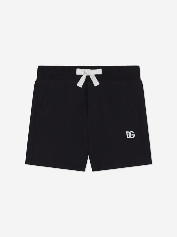 Introduce a touch of Italian elegance to your little one's wardrobe with the Baby Boys Logo Shorts in Navy by Dolce Gabbana. Perfect for SS2025, these shorts blend impeccable style with ultimate comfort. Here's why they're a wardrobe essential Crafted in Italy Meticulously made, ensuring premium quality and durability. Chic Design Emblazoned with the iconic Dolce Gabbana logo for an unmistakable designer touch. Comfortable Fit Soft fabric ensures comfort for all-day play and adventures. Ideal for any Occasion Versatile and stylish, perfect for casual outings or special events.Enhance your child's closet with these luxurious shortsstyle and comfort in one delightful package!