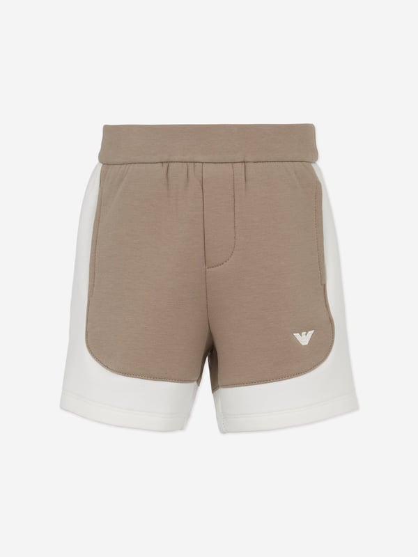 Baby Boys Colourblock Shorts in Brown Revamp your little ones wardrobe with the Baby Boys Colourblock Shorts in Brown by Emporio Armani this SS2025. Elegantly combining style with comfort, these designer shorts are a quintessential piece for the fashionable young gentleman. Premium Quality Crafted from superior materials ensuring durability comfort. Stylish Design Features a chic colourblock pattern in a subtle brown palette. Perfect Fit Tailored for comfortable play and movement.Embrace luxury reliability with Emporio Armani. Order now!