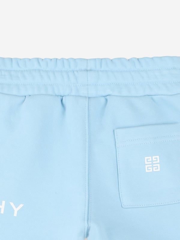 Baby Boys Logo Print Short in Blue Givenchy combine classicism with subversion in their visually compelling portraits. These baby boys sea shorts are reflective of the French luxury label's sleek high quality and versatile edge. Engineered in the finest high quality, showcasing an elasticated drawstring waist, Givenchy print on the side, and a 4G print on the back pocket. Fleece 85 Organic Cotton, 15 Polyester