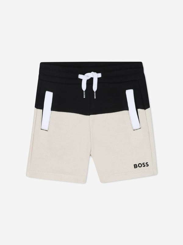 Introducing the BOSS Baby Boys Colourblock Shorts in Black a sophisticated addition to any young gentleman's SS2025 wardrobe. Exquisitely crafted from premium materials, these shorts offer both flair and comfort. Notable features include Chic Colourblock Design Striking black hues paired with a clean, modern silhouette ensures your little one looks sharp. Supreme Comfort Soft, breathable fabric perfect for all-day play. Durable Fabrication Crafted to withstand the rigours of childhood. Elevate your child's style this season with BOSS.