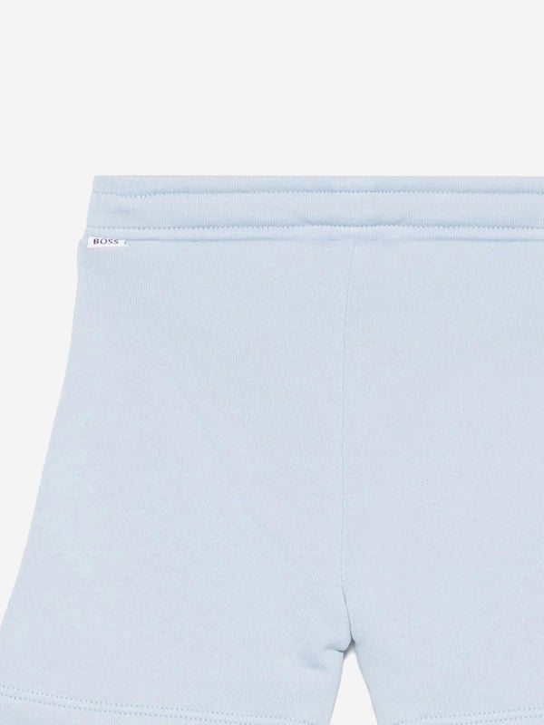 Introducing the BOSS Baby Boys Logo Shorts in Blue the epitome of luxury for the young and fashion-forward this SS2025 Impeccable Craftsmanship Expertly tailored for comfort and durability. Signature BOSS Design Features the iconic BOSS logo in a subtle, stylish print. Luxurious Comfort Crafted with premium, soft fabrics ideal for delicate skin. Versatile Style Perfect for casual outings or special occasions. Elevate your childs wardrobe with these chic, timeless shorts. Shop now!