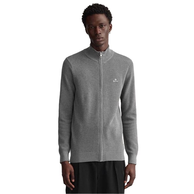 Gant - Strickjacke Mit Reißverschluss für Herren (Grau) 100% Baumwolle. Gewebe: Jerseyware, Piqué. Design: Gesticktes Logo, Unifarben. Saum: Anliegend, gerippt. Bündchen: Anliegend, gerippt. Hoch geschnitten. Langärmlig. Strukturiert. Passform: Regulär. Durchgehender Reißverschluss. S: 95,25 cm. M: 100 cm. L: 108 cm. XXL: 118,11 cm.