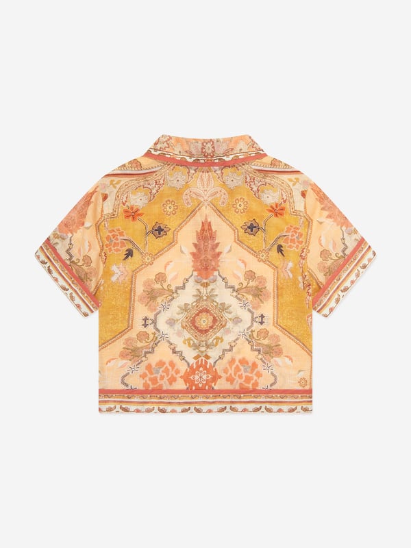 Australian label Zimmermann redefine the strategy of fashion by exploring their own identity that is neither trend-driven nor futuristic. This girls Wylie pocket shirt is woven in beautiful lightweight cotton in orange, beige and yellow shades, with a refined vintage style print. Soft and semi-sheer, it has a Cuban collar, a chest pocket, and button fastenings. 100 Cotton
