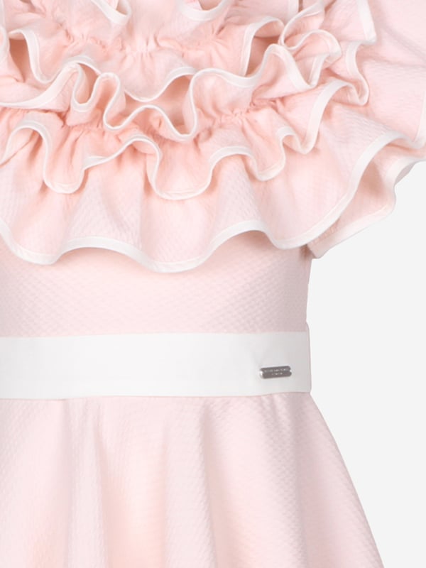 Jessie and James embody timeless elegance and modern charm. This girls pink dotty dress is reflective of the label's distinctive care and craftsmanship. Has luxurious ruffled detailing with a high neck and delicate flared hem. It is signified by a contrasting white belt with a branded silver plate to finish. Made in France Concealed Zip Fastening Short Sleeves Outer Cotton 74, Polyester 26 Lining Cotton 100