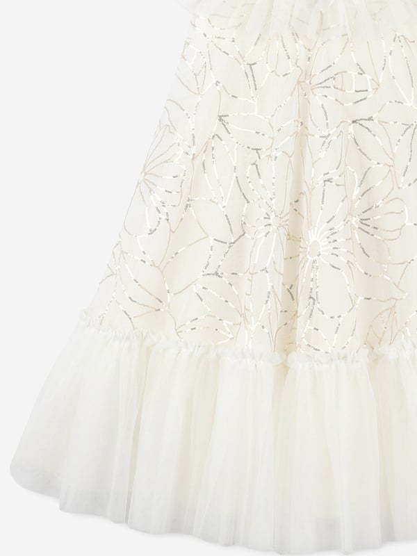 Billieblush apply a mischievous and quirky sensibility to their aesthetic portraits. This girls ivory dress encapsulates the label's fun and eccentric personality. Square Neckline Layers of Tulle Floral Gold Sequin Pattern Ruffled Tulle Neckline and Hem Soft Viscose Fastens At Back With Keyhole Button 100 Polyester Lining 97 Viscose, 3 Elastane Machine Wash 30C