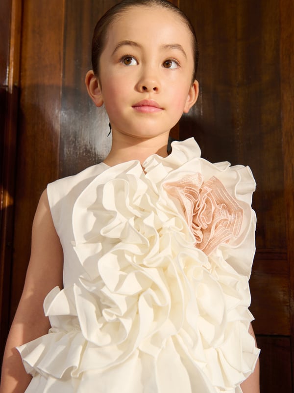 Introducing the exquisite Girls Adage Ruffle Flower Dress in White by Jessie and James, a quintessential addition to your little girl's wardrobe for SS2025. Crafted with precision and flair, it epitomizes elegance and comfort. Discover the features that set it apart Enchanting White Hue Radiates purity and sophistication, perfect for any occasion. Delicate Ruffle Detailing Adds a touch of whimsy and girlish charm. Premium Fabric Ensures comfort and durability for all-day wear. Elevate her style with this remarkable piece!