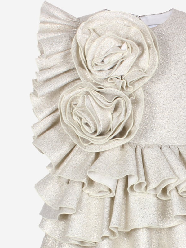 Introducing the exquisite Girls In Bloom Ruffle Flower Dress in Gold by Jessie and James, tailor-made for the spring-summer season of 2025. Ensure your young lady dazzles with this must-have garment Refined Gold Hue A radiant colour that exudes luxury sophistication. Delicate Ruffle Detailing Enhances the dress with elegance charm. Premium Fabrication Crafted for comfort durability through any festive occasion.Revitalize her wardrobe with the Girls In Bloom Dress. Order today let her shine with unparalleled style!
