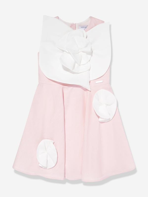 Introducing the exquisite Girls Peony Flower Dress in Pink by Jessie and James, a quintessential addition for SS2025, designed to enchant and delight. Elegant Design Crafted with a delicate peony print, exuding timeless grace and femininity. Luxurious Fabric Tailored from premium fabric, ensuring both comfort and durability for any occasion. Vibrant Pink Hue A charming, rich pink shade that captures the essence of spring and fashion-forward allure.Enrich your little girl's wardrobe with this splendid piece from Jessie and James. Secure the season's must-have now!