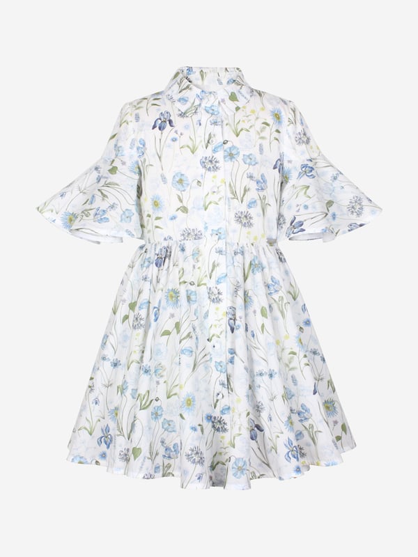 Step into the season with the 'Girls Little Sister Blue Meadow Print Dress in White' from Jessie and James, an essential addition to your little one's SS2025 wardrobe. Crafted with elegance and panache, this dress encapsulates the joy of summer with its delicate features Eye-Catching Meadow Print Features a vibrant and charming blue meadow design, perfect for sunny days. Exquisite Craftsmanship Expertly tailored using premium materials for both comfort and style. Versatile Style Ideal for both special occasions and casual outings, ensuring your girl looks her best always.Revitalise her collection with this pristine white, fashion-forward piece!