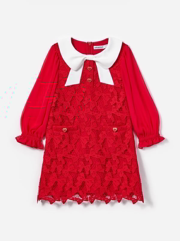 Self-Portrait incorporate beautiful properties into their exquisite designs. This girls red bow lace dress is inspired by Parisian archives with a modern twist. Made in beautiful high quality with intricate lace bow technology and precision. Features a Victorian-inspired Peter Pan collar depicting a large bow and long chiffon sleeves with elasticated cuffs. Signified by heart-shaped diamanté buttons and front welt pockets, she will be obsessed. Round Neck Zip Fastening Main Fabric 1 100 Polyester Main Fabric 2 100 Polyester Lining 100 Polyester