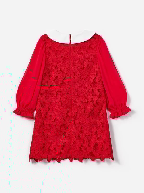 Self-Portrait incorporate beautiful properties into their exquisite designs. This girls red bow lace dress is inspired by Parisian archives with a modern twist. Made in beautiful high quality with intricate lace bow technology and precision. Features a Victorian-inspired Peter Pan collar depicting a large bow and long chiffon sleeves with elasticated cuffs. Signified by heart-shaped diamanté buttons and front welt pockets, she will be obsessed. Round Neck Zip Fastening Main Fabric 1 100 Polyester Main Fabric 2 100 Polyester Lining 100 Polyester