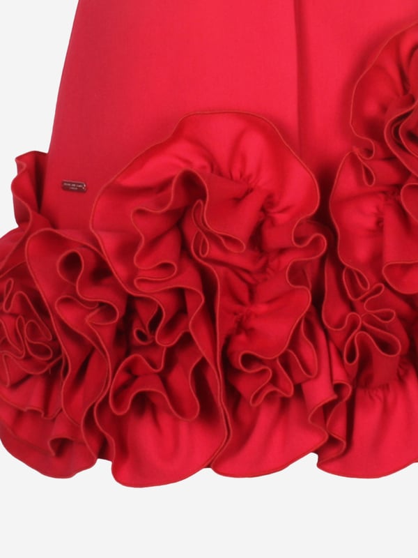 Jessie James depict energy and passion in their refined contemporary abstracts. This girls Dream on Frilly Flower dress is inspired by fairytale archives with a new innovative twist. It showcases an A-line silhouette with a shirt collar, asymmetric frills, and abstract flowers decorating the hem. It is her perfect holiday season piece to make an unforgettable entrance. Short Sleeves Hidden Button Placket