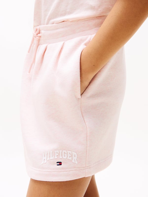 Introducing the Tommy Hilfiger Girls Terry Skirt in Pink, a stunning essential for SS2025. This skirt exudes charm and sophistication, perfect for the modern young lady. Key features include Exquisite Pink Hue Radiates a gentle yet vibrant charm, ideally capturing the playful spirit of youth. Luxurious Terry Fabric Offers both supreme comfort and durability, ensuring it's perfect for both play and special occasions. Signature Tommy Hilfiger Style Embellished with the iconic branding, it's a true testament to timeless fashion.Elevate your girl's wardrobe with this chic and stylish piece.