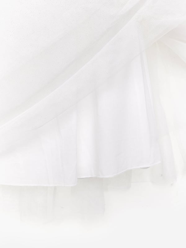 BCBG Girls Glitter Tulle Skirt in Ivory Introducing the exquisite Girls Glitter Tulle Skirt in Ivory, crafted by BCBG for SS2025 a quintessential piece for any young ladys wardrobe. Heres why this skirt is a must-have Enchanting Ivory Shade A soft, elegant colour that complements any top. Glittering Accents Adds a touch of sparkle, perfect for special occasions. Luxurious Tulle Fabric Delivers a fairy-tale silhouette while ensuring comfort. Timeless Design Ideal for both formal events and playful outings.Elevate her style with this charming skirt from BCBG. Don't miss outenhance her wardrobe today!
