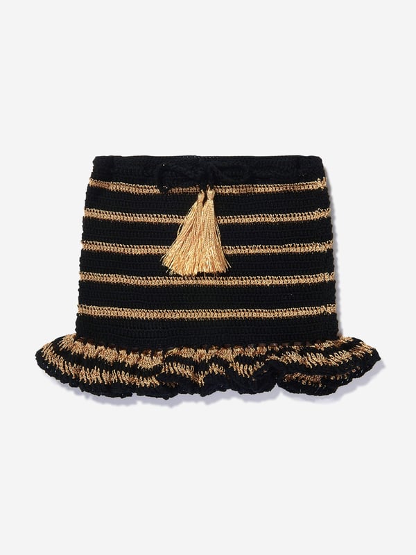 Nessi Byrd incorporate captivating materials into their everyday luxury swimwear. This girls Yulia black and gold crop skirt is reflective of the New York label's meticulous attention and preference for vibrant aesthetics. Crafted in a beautiful crochet design via an elasticated waistband and tassel detail. Crochet Material 100 Cotton