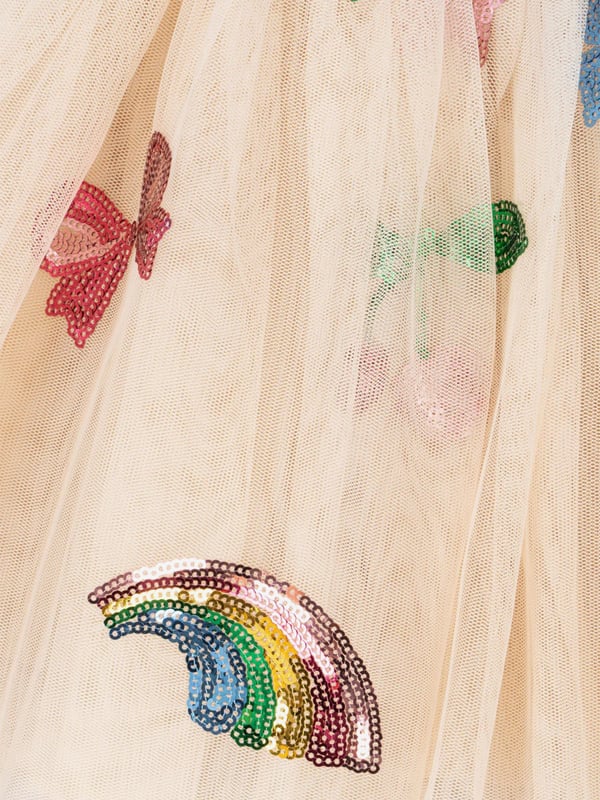 Konges Sløjd incorporate beautiful, eco-friendly technology into their charming aesthetics. This girls Yvonne rainbow twinkle tutu is woven in voluminous tulle layers and a soft elastic waist. It has whimsical sequin motifs, showcasing crescent moons, bows, rainbows, and cherries. 100 Polyester 100 Cotton Lining