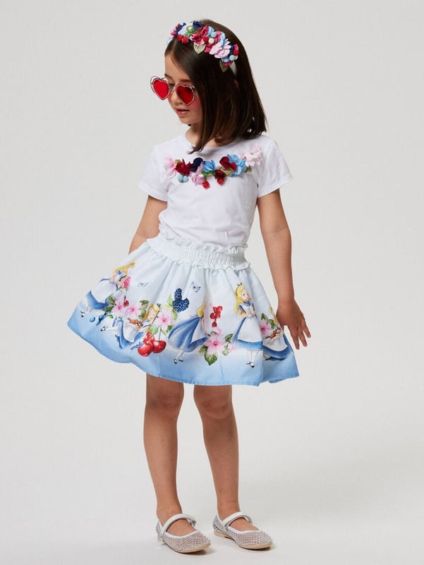 Girls Alice In Wonderland Skirt in Blue Introducing the enchanting Girls Alice In Wonderland Skirt in Blue by monnalisa. An exquisite addition to your young ladys wardrobe for SS2025, crafted with impeccable Italian finesse. Here's why its the pinnacle of girl's fashion Exquisite Italian Craftsmanship Expertly tailored for unrivalled quality and enduring charm. Captivating Wonderland Blue A vibrant shade that brings Alices adventures to life. Soft, Premium Fabric Ensures comfort style are never compromised.Revamp her collection with this timeless, playful piece. Perfect for making everyday magical!