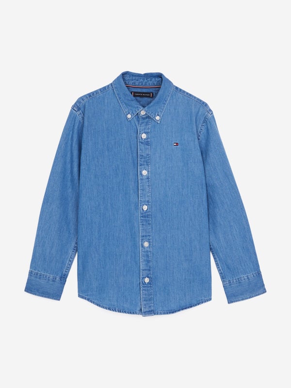 Step into timeless style with the Tommy Hilfiger Boys Denim Chambray Shirt in Blue, a sartorial staple for SS2025. Crafted from meticulously sourced fabric, this piece offers both comfort and classic charm. Its distinctive features include Exquisite Chambray Fabric Lightweight and breathable, ideal for playful days and serene evenings. Signature Tommy Detailing Elevate his look with iconic stitching and logos. Versatile Style Perfect for both casual and smart-casual occasions.Revitalize his wardrobe with this quintessential Tommy Hilfiger creation!