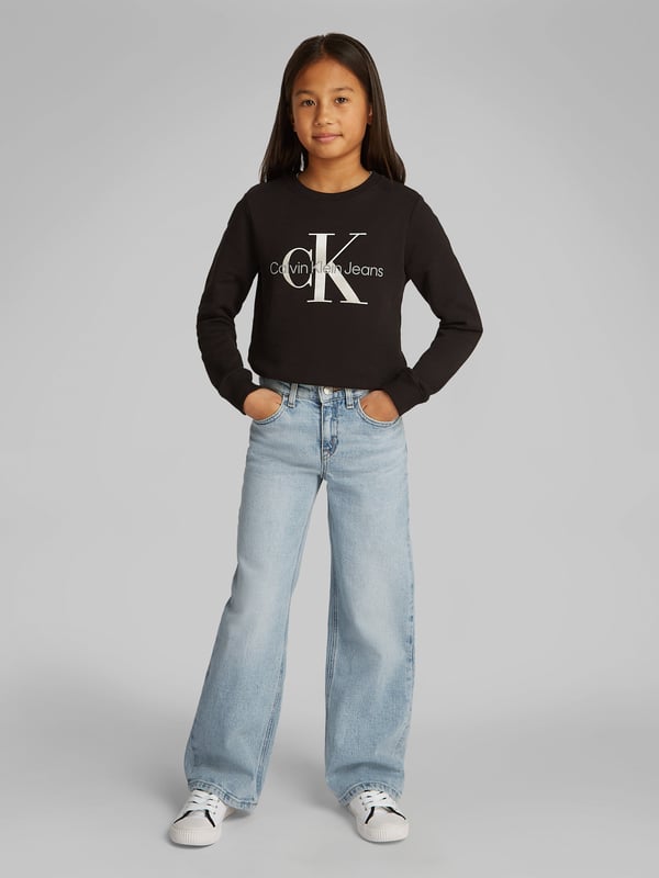Introducing the SS2025 essential from Calvin Klein the Girls Wide Leg Jeans in Blue, a sophisticated blend of high fashion and casual comfort tailored for your Girl. Each pair is an ode to timeless style and modern sensibilities. Discover its standout features Effortlessly Stylish With a breezy wide-leg silhouette, these jeans embody chic versatility. Luxe Fabrication Crafted from premium denim to ensure superb comfort durability. Signature Detailing Adorned with the iconic Calvin Klein branding, elevating everyday ensembles.Revitalise her wardrobe with a touch of designer flair. Ideal for both day-to-day wear and special occasions.