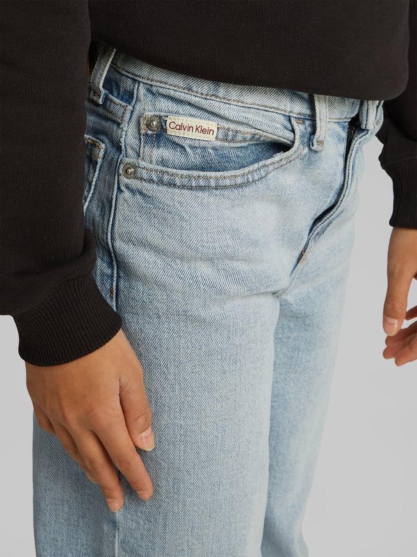 Introducing the SS2025 essential from Calvin Klein the Girls Wide Leg Jeans in Blue, a sophisticated blend of high fashion and casual comfort tailored for your Girl. Each pair is an ode to timeless style and modern sensibilities. Discover its standout features Effortlessly Stylish With a breezy wide-leg silhouette, these jeans embody chic versatility. Luxe Fabrication Crafted from premium denim to ensure superb comfort durability. Signature Detailing Adorned with the iconic Calvin Klein branding, elevating everyday ensembles.Revitalise her wardrobe with a touch of designer flair. Ideal for both day-to-day wear and special occasions.