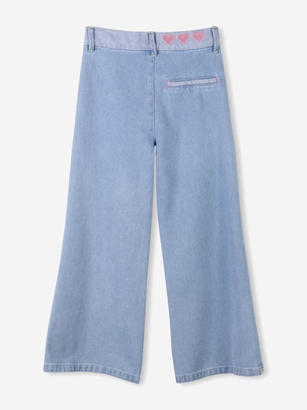 Introducing the exquisite Girls Denim Trousers in Blue from billieblush a quintessential addition to the SS2025 wardrobe. Exuding sophistication and premier craftsmanship, these trousers are tailored for the discerning young lady. Key features include Premium Denim Crafted from high-grade denim ensuring durability chic aesthetic. Bespoke Detailing Adorned with delicate embellishments that radiate elegance. Comfort Fit Engineered for comfort, enabling endless adventures.Elevate her style with billieblush's latest denim marvel. Purchase today and witness timeless fashion unfold!