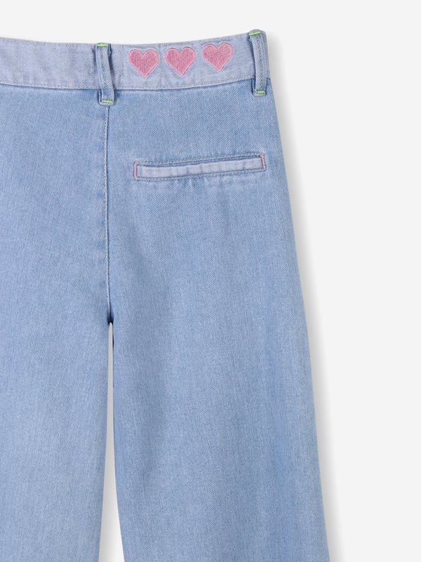 Introducing the exquisite Girls Denim Trousers in Blue from billieblush a quintessential addition to the SS2025 wardrobe. Exuding sophistication and premier craftsmanship, these trousers are tailored for the discerning young lady. Key features include Premium Denim Crafted from high-grade denim ensuring durability chic aesthetic. Bespoke Detailing Adorned with delicate embellishments that radiate elegance. Comfort Fit Engineered for comfort, enabling endless adventures.Elevate her style with billieblush's latest denim marvel. Purchase today and witness timeless fashion unfold!