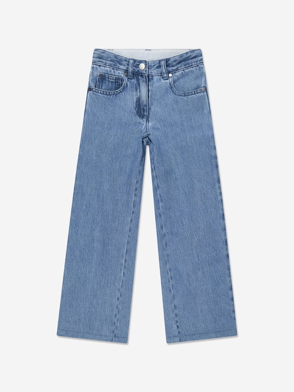 Girls Wide Leg Jeans in Blue Introducing the Stella McCartney Girls Wide Leg Jeans in Blue, an essential addition to your young one's SS2025 wardrobe. Crafted in a striking blue hue, these jeans blend high fashion with practical comfort. Key features include Chic Wide-Leg Design Offers a modern twist on classic denim, perfect for trendsetting youngsters. Premium Quality Fabric Durable yet soft, ensuring comfort throughout the day. Versatile Styling Easily pairs with both casual tees and elegant tops for versatility. Revamp her style with these exquisite jeans by Stella McCartney. Order now to infuse elegance into her everyday ensembles!