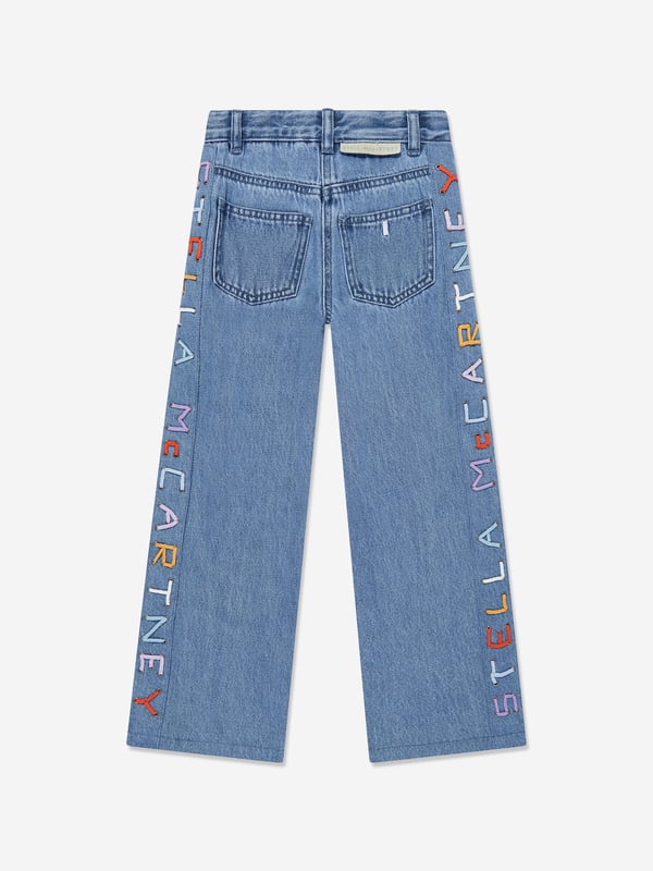 Girls Wide Leg Jeans in Blue Introducing the Stella McCartney Girls Wide Leg Jeans in Blue, an essential addition to your young one's SS2025 wardrobe. Crafted in a striking blue hue, these jeans blend high fashion with practical comfort. Key features include Chic Wide-Leg Design Offers a modern twist on classic denim, perfect for trendsetting youngsters. Premium Quality Fabric Durable yet soft, ensuring comfort throughout the day. Versatile Styling Easily pairs with both casual tees and elegant tops for versatility. Revamp her style with these exquisite jeans by Stella McCartney. Order now to infuse elegance into her everyday ensembles!