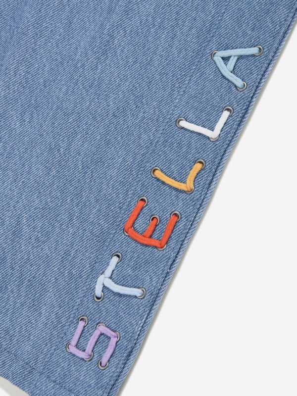 Girls Wide Leg Jeans in Blue Introducing the Stella McCartney Girls Wide Leg Jeans in Blue, an essential addition to your young one's SS2025 wardrobe. Crafted in a striking blue hue, these jeans blend high fashion with practical comfort. Key features include Chic Wide-Leg Design Offers a modern twist on classic denim, perfect for trendsetting youngsters. Premium Quality Fabric Durable yet soft, ensuring comfort throughout the day. Versatile Styling Easily pairs with both casual tees and elegant tops for versatility. Revamp her style with these exquisite jeans by Stella McCartney. Order now to infuse elegance into her everyday ensembles!