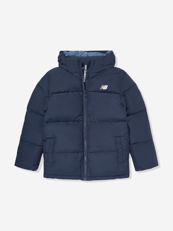 New Balance depict American apparel into timeless sophisticated wear. This boys NB navy puffer jacket is engineered in beautiful heavy padding and a nylon lining for extra warmth. Perfect for the cooler season. 64 Cotton, 36 Nylon