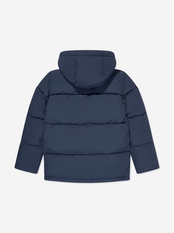 New Balance depict American apparel into timeless sophisticated wear. This boys NB navy puffer jacket is engineered in beautiful heavy padding and a nylon lining for extra warmth. Perfect for the cooler season. 64 Cotton, 36 Nylon