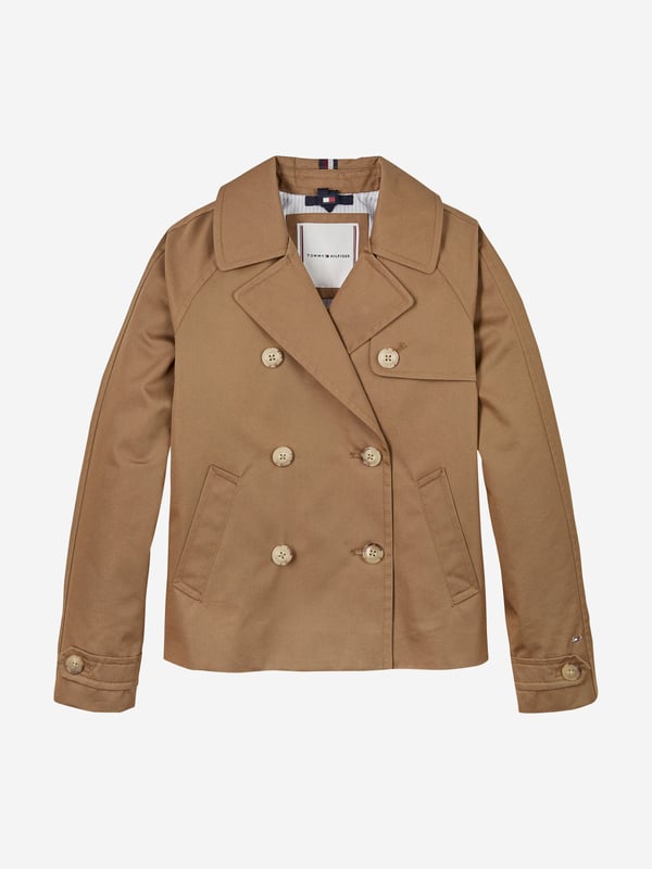 Girls Short Cotton Jacket in Brown Introducing the SS2025 must-have Tommy Hilfiger's Girls Short Cotton Jacket in a chic brown hue. Perfectly tailored for the style-conscious young lady, this piece effortlessly marries sophistication with youthful charm. Key features include Elegantly Tailored A precise, chic cut that offers both comfort and style. Premium Cotton Crafted from high-grade cotton, ensuring durability and breathability. Versatile Hue The charming brown colour complements various outfits, ideal for any occasion. Designer Appeal Branded with the prestigious Tommy Hilfiger emblem, adding a luxe touch. Elevate her wardrobe with this exquisite jacket!