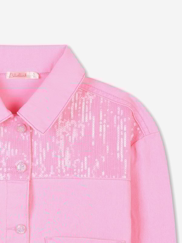 Billieblush incorporate high quality detailing and an advanced outlook on contemporary designs. This girls pink sports jacket is envisioned in beautiful craftsmanship. Inspired by 70s archives, it is engineered in a beautiful cotton denim design, showcasing patch pockets on the front and frayed cuffs. The sophisticated piece is embellished with sequins on the front and a rubberised logo on the back. Long Sleeves Pointed Collar Front Fastening With Snap Buttons 100 Cotton