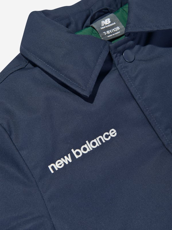 New Balance combine modern innovation with classic portraits. This boys NB navy premium short jacket is a captivating construction. Designed to keep up with active kids, they will emanate unparalleled style. 65 Cotton, 35 Polyester Twill