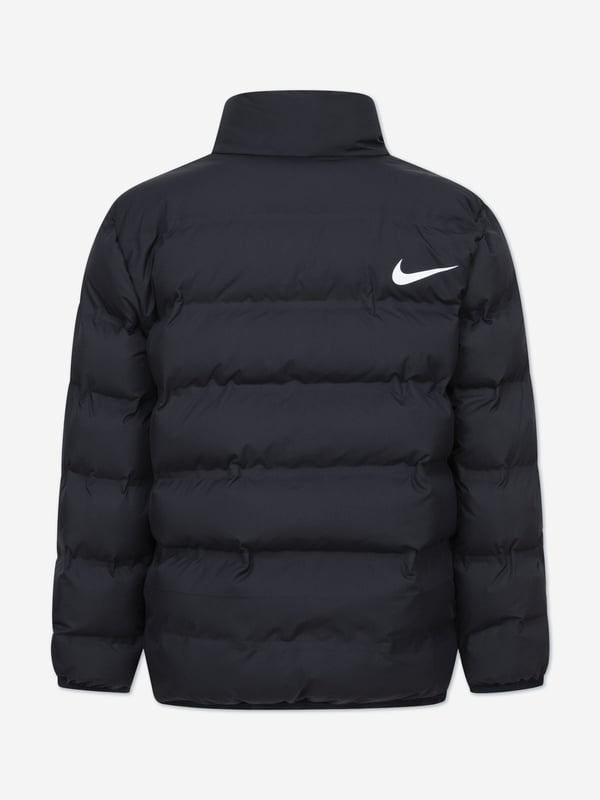 Introducing the Kids Wrap Swoosh Debossed Quilt Jacket in sleek black, a luxurious addition to any child's wardrobe for AW2024. Crafted by Nike, this designer jacket blends cutting-edge style with exceptional comfort and warmth. Perfect for both boys and girls, here are its standout features Debossed Nike Swoosh Offers a subtle yet iconic branding. Premium Quilted Design Ensures your child stays warm while looking stylish. Versatile Black colour Matches effortlessly with any outfit.Elevate your child's fashion game with the Kids Wrap Swoosh Quilt Jacket. Ideal for the cool days of AW2024, it promises style and snugness in one!
