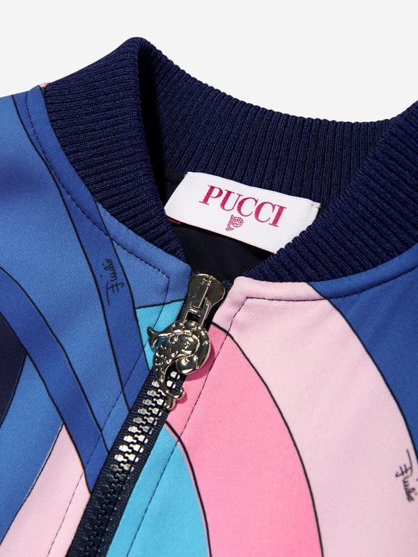 Emilio Pucci embody innovation and timeless luxury in their designs. This girls multicolour short jacket is a captivating everyday piece to be adored. Made in Italy Varsity Style Collar Trims Pockets Archival 'Maddena' Motif From the 60s Multicoloured Print Ribbed Trims Silver Embellished Zip 96 Viscose, 4 Elastane Lining 100 Cotton