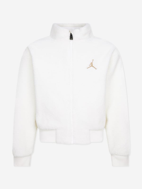 Introducing the Girls Jumpman Sherpa Jacket in Ivory, by Jordan a luxurious staple for AW2024 that perfectly blends Jordan's iconic style with plush comfort for the fashion-forward young girl. Exquisite Ivory Sherpa Crafted in sumptuous ivory Sherpa fleece, ensuring warmth and ultra-softness. Elegant Design Features a refined, minimalist design with smooth lines that exude class. Signature Jumpman Emblem Embellished with the classic Jumpman logo, adding a distinguished touch of athletic prestige. Versatile Style Ideal for stylish layering, perfectly pairs with both casual and chic outfits.Elevate her wardrobe with this exquisite piece from Jordan. Shop now for unmatched style and comfort!