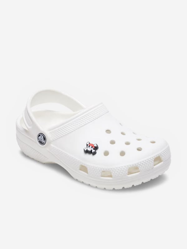 Add some swashbuckling style to your Crocs with the Tiny Pirate Skull Jibbitz charm! This detailed accessory features a miniature pirate skull design. Easy to customise and perfect for all ages, it adds a dash of pirate flair to your footwear. Set sail for fun and fashionget yours today! NOTE Sold Separately to Shoe Not a Toy Not Intended For Children Under 3 Years Of Age