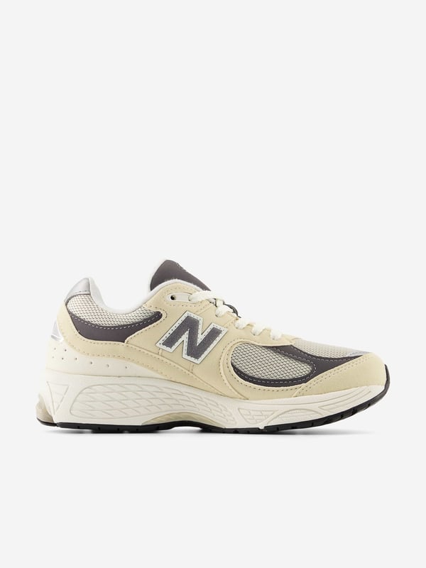 Introducing the Boys 2002 Trainers in Beige by new_balance an essential addition to any stylish wardrobe for SS2024! Perfectly blending high fashion with everyday practicality, these trainers are crafted to stand out and deliver comfort. Here are the standout features Sleek Beige Design Crafted in a versatile beige hue, matching effortlessly with any outfit. Superior Comfort Engineered with new_balance's signature cushioning technology to ensure all-day comfort. Durable Construction Made with premium materials for lasting wear and exceptional performance.Elevate your style with the Boys 2002 Trainers in Beige. Perfect for any occasion, these are the shoes every young trendsetter needs. Shop now to let your style shine!