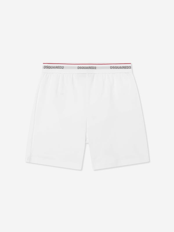 Introducing the exquisite and elegant Kids Short Pyjama Set in White from dsquared2 kids, an impeccable choice for any discerning Boy or Girl's SS2025 wardrobe. This set perfectly balances design and comfort, offering key features that set it apart Refined simplicity Crafted in pristine white, perfect for serene nighttimes or stylish slumber parties. Luxurious comfort Made from the softest fabrics, ensuring a peaceful sleep. Contemporary design Meticulously tailored for a chic, modern fit, adding a dash of sophistication to bedtime rituals. Transform bedtime with this pristine pyjama set from dsquared2 kids.