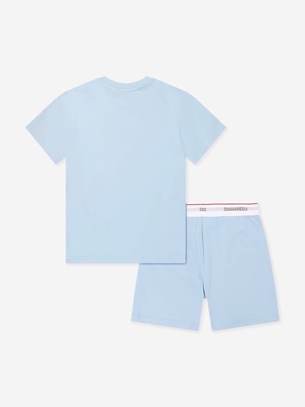 Introducing the exquisite Kids Short Pyjama Set in Blue from dsquared2 kids, an essential addition to your child's SS2025 wardrobe. Crafted with meticulous attention to detail, this set ensures both style and comfort for any young trendsetter. Luxurious Comfort Constructed from premium fabrics that are soft on the skin, ensuring a restful sleep. Charming Design Features a chic, contemporary print, perfect for both boys and girls. Superior Craftsmanship Embodying dsquared2's commitment to quality, these pyjamas offer durability and refined style.Elevate your child's nightwear with this stylish and cosy set. Act now to ensure they enjoy comfort in unparalleled style!