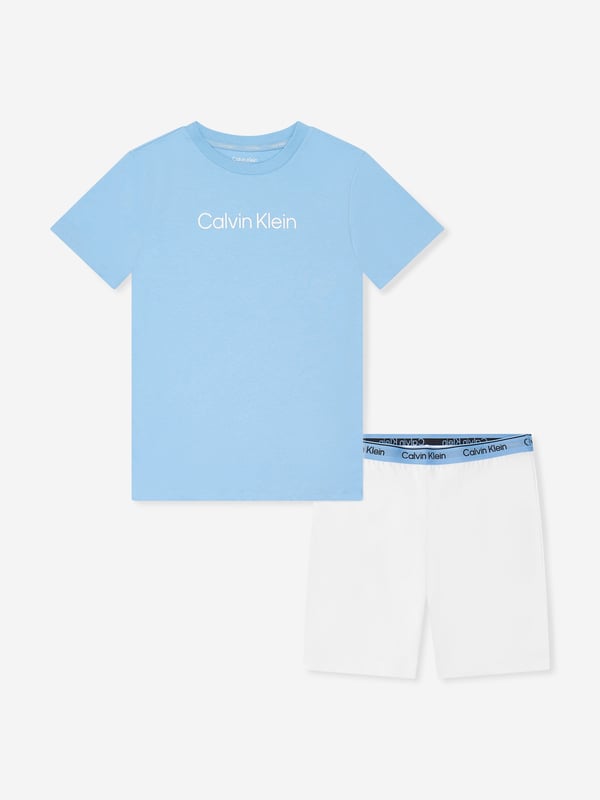 Introducing the Calvin Klein Boys Pyjamas Short Set in Multicolour. Packed with style and comfort, it is an ideal gift choice for your charming boy. Mindfully selected features brighten its appeal Stylish Trendy The playful multicolour print adds a fashion-forward element to your boy's wardrobe. Ultimate Comfort Crafted from high-grade fabrics, it promotes easy movement and gentle softness, perfect for everyday adventures. Brand Value Embrace the quality and style of Calvin Klein Underwear. Every pyjama set resonates with its well-known luxury appeal. Let your child stand out in comfort and style with this coveted piece!