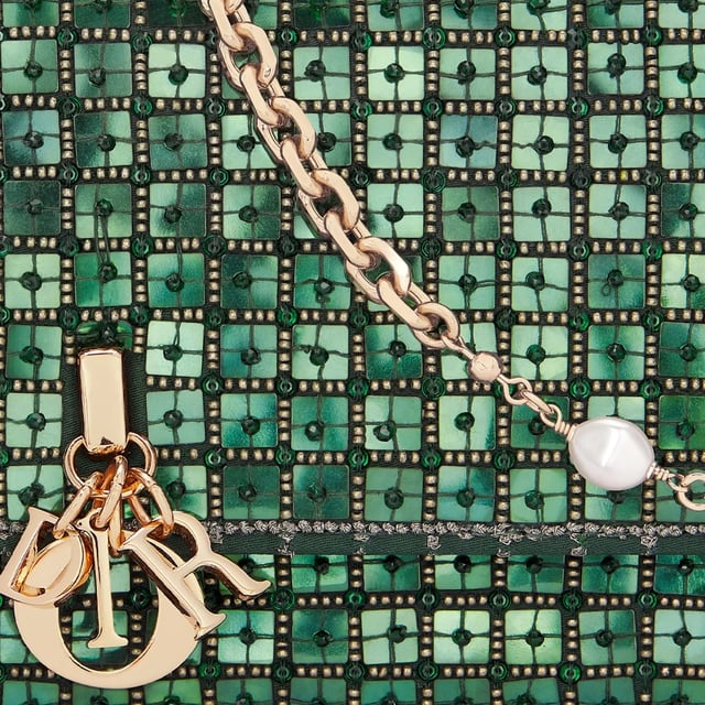 Composition: 100% Leather  

height 11 cm
Width 4 cm
Removable chain strap
Length 21 cm
Entirely embroidered with square sequins and pine green pearls
Flap enhanced by the D.I.O.R. charm
Compartments and card slots
Top leather handle
Made in  Italy
Gender: WOMEN
Product code: S0900OIBJ_M92
Barcode: 9990002777009
Code: BAG CD 2 SD FW24 12243
 Measurments:  width: 40 mm length: 210 mm height: 110 mm