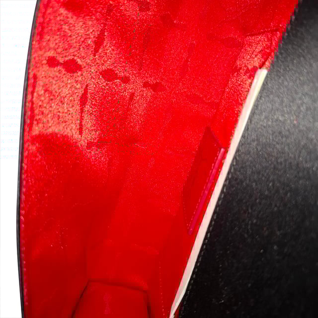 VINTAGE, RRP AS NEW
The Christian Louboutin Bow Clutch Bag in black satin is the epitome of evening elegance, featuring a sculptural bow detail and the brand’s signature red lining. Its sleek silhouette and soft satin finish bring a touch of Parisian glamour to any formal look. **Style tip:** Pair it with a strapless gown or a tailored jumpsuit to highlight the clutch’s sophisticated charm and statement bow.

 Christian Louboutin Bow Clutch Bag in Black Satin

Condition: Excellent
Signs of wear: No retail tag, No visible sign of wear., 
Packaging: Dust bag
Color: Black
Material: Satin 
Size: One Size | One Size
Measurements: Width: 45; Height: 90; Length: 220
SKU: NAPPUGBBA525368W