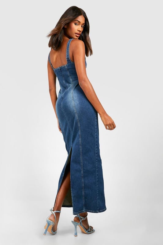 Stretch Denim Seam Detail Maxi Dress Figure-hugging maxi dress with stretch denim fabric
Distinctive seam detailing for added visual interest
Square neckline and thick straps for a flattering silhouette
Side slit for ease of movement and a touch of allure
Versatile design suitable for various casual occasions
Make a statement in this striking stretch denim maxi dress that combines comfort with style. The form-fitting silhouette accentuates your curves while the seam detailing adds a unique touch to the classic denim look. Perfect for those who want to stand out at casual events, this dress can be easily dressed up or down. Pair it with strappy heels and statement earrings for a chic daytime look, or throw on a denim jacket and trainers for a more relaxed vibe. The side slit offers both practicality and a hint of glamour, making it ideal for summer barbecues, casual dates, or weekend brunches with friends. This Boohoo dress embodies the brand's ethos of trendy, inclusive fashion that doesn't compromise on style or comfort, making it a must-have addition to any fashion-forward wardrobe.