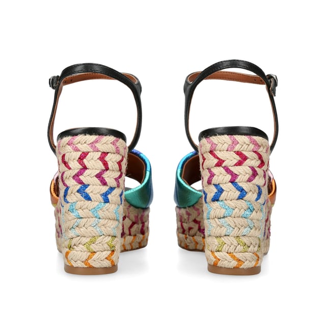 The Kensington Espadrille, an addition to the iconic Kensington collection, is crafted in a pebble grain cow leather in the iconic rainbow sewn stripe pattern. The rope wedge heel features rainbow thread running through the heel. Heel height: 10.5cm.