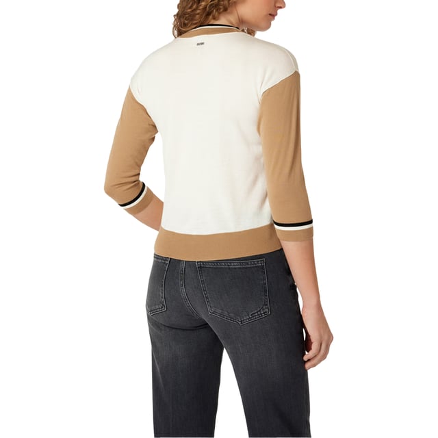 100% Wol. Ontwerp: Kleurenblok, Effen. Hem: Ribben. Halslijn: Crew Neck, Ribbed. Drop Shoulder. Mouwtype: Raglan met lange mouwen, Raglan met lange mouwen. Manchet: Ribbel. Pasvorm: Recht model. Bevestiging: Trek aan de achterkant. 8 UK: 32 in. 10 VK: 33 in.